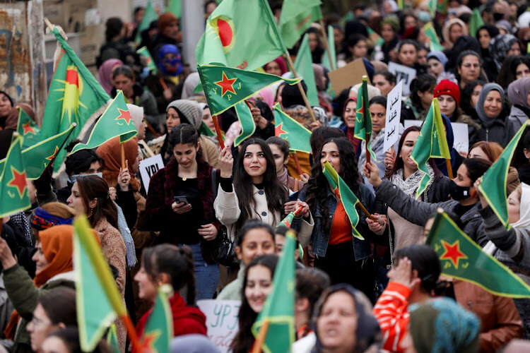 Kurdish women during a rally in Qamishli on Monday. Reuters